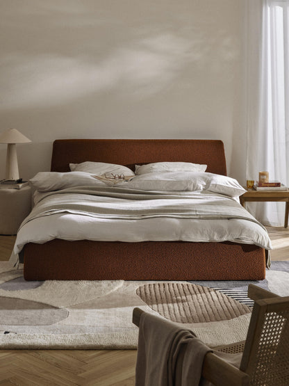 Clovis Bouclé Upholstered Bed with Storage